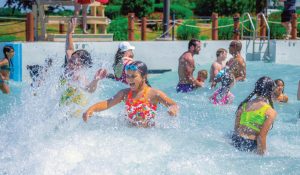 Girls splashing in wave pool